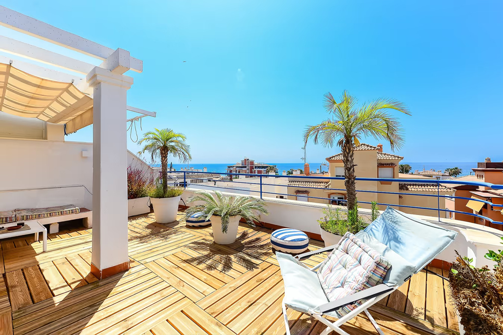 Sun soaked balcony with sea views in Nerja apartment